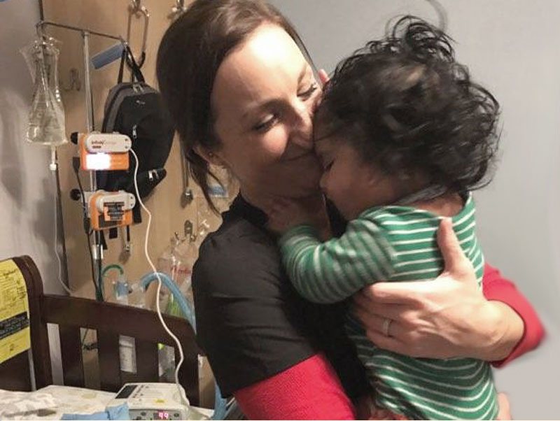 nurse holding baby